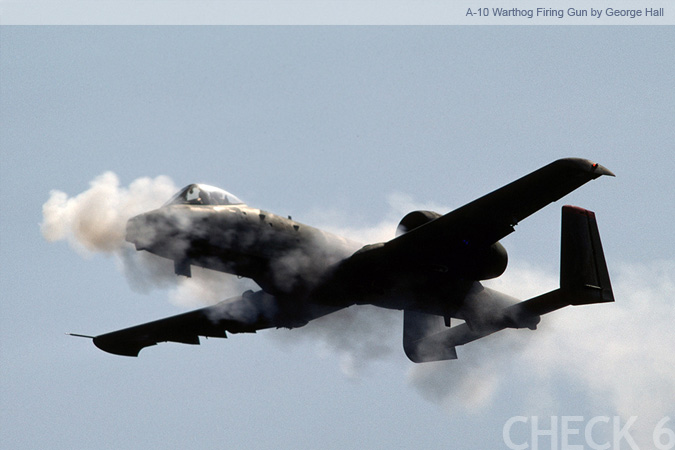 A-10 Firing Its Gun - by George Hall