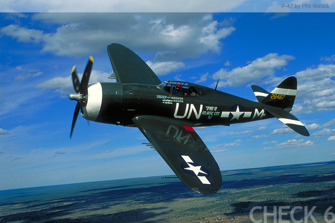 P-47 in Flight - by Phil Wallick