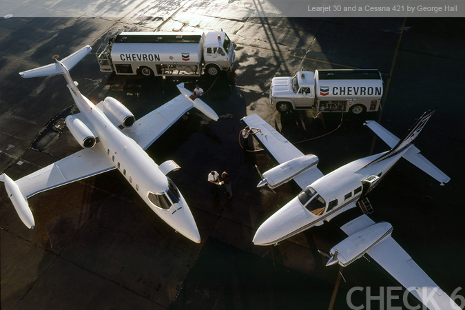 Learjet 30 and Cessna 421 by George Hall